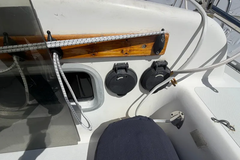 Slide: The Image of Cockpit view of 1989 Freedom 38 Sloop sailboat, featuring winches and rigging details. - 56