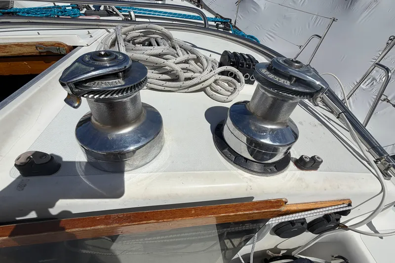 Slide: The Image of Winches and ropes on 1989 Freedom 38 Sloop sailboat deck. - 57