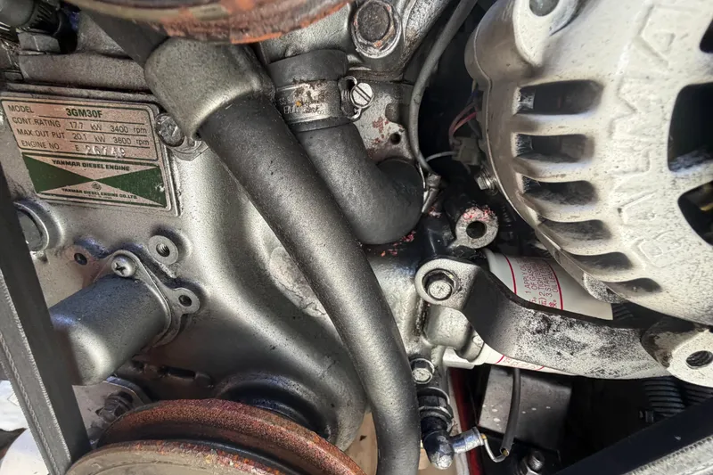 Slide: The Image of Close-up of a Yanmar diesel engine in a 1989 Freedom 38 Sloop sailboat. - 59