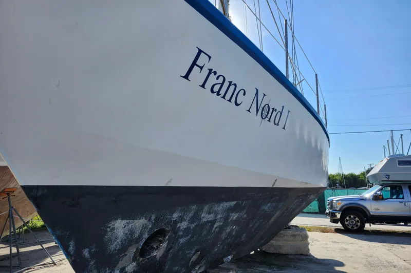 Slide: The Image of 1987 Custom Weld Exploration boat "Franc Nord I" on dry dock, with truck nearby. - 26