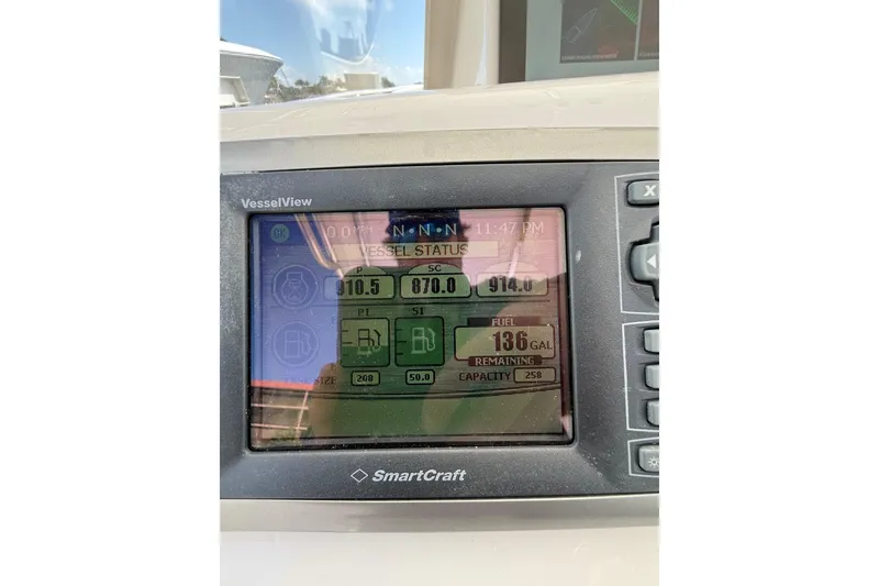 Slide: The Image of SmartCraft VesselView display on 2010 Intrepid 323 Cuddy, showing vessel status and fuel capacity. - 19