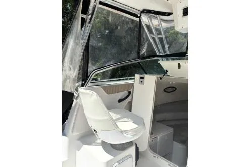 Slide: The Image of 2006 Seaswirl Striper 2601 Walkaround O/B interior with seating and cabin view. - 5