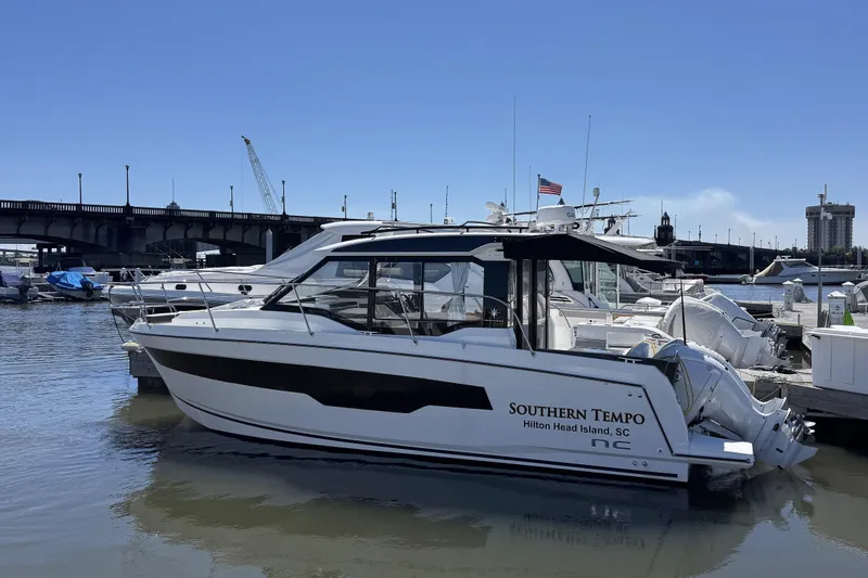 The Image of 2024 Jeanneau NC 895 Series 2 boat docked at marina, Hilton Head Island, SC. - 0