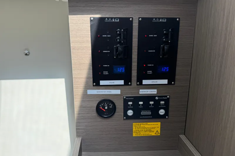 Slide: The Image of Control panel of 2024 Jeanneau NC 895 Series 2 boat, featuring generator and power settings. - 17