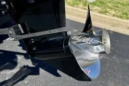 Slide: The Image of 2025 Tracker Bass Tracker Classic XL boat propeller on asphalt background. - 5