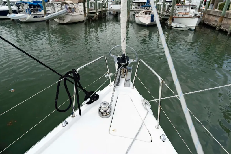 Slide: The Image of Bow view of 2017 Beneteau Oceanis 41.1 sailboat docked in a marina. - 18