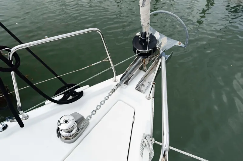 Slide: The Image of Bow of 2017 Beneteau Oceanis 41.1 yacht with anchor and chain in water. - 19