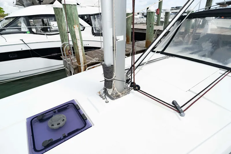 Slide: The Image of 2017 Beneteau Oceanis 41.1 yacht deck with mast and rigging at marina. - 23