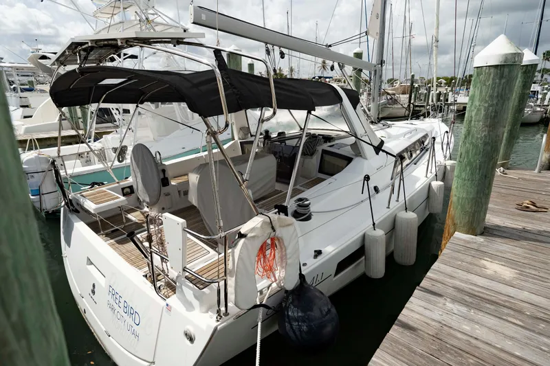 Slide: The Image of 2017 Beneteau Oceanis 41.1 yacht docked at marina, featuring sleek design and spacious deck. - 3