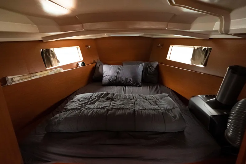 Slide: The Image of Cozy cabin interior of 2017 Beneteau Oceanis 41.1 sailboat with comfortable bedding. - 47