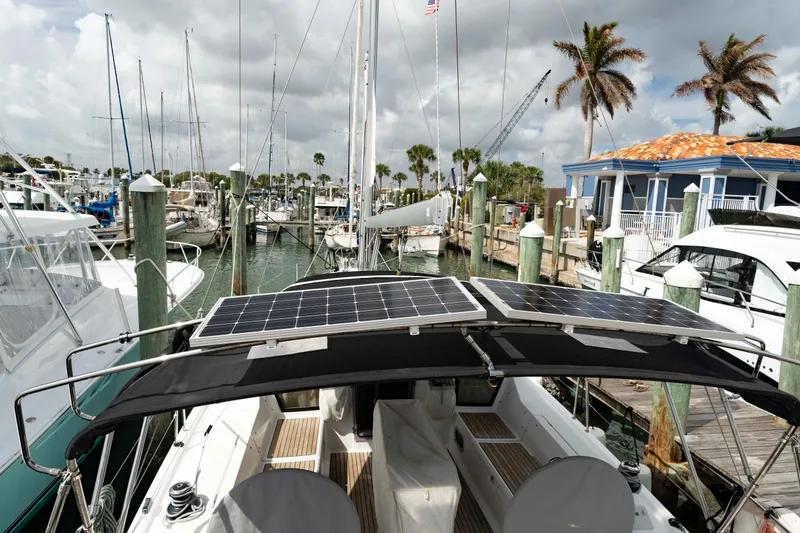 Slide: The Image of 2017 Beneteau Oceanis 41.1 sailboat with solar panels docked at marina. - 7