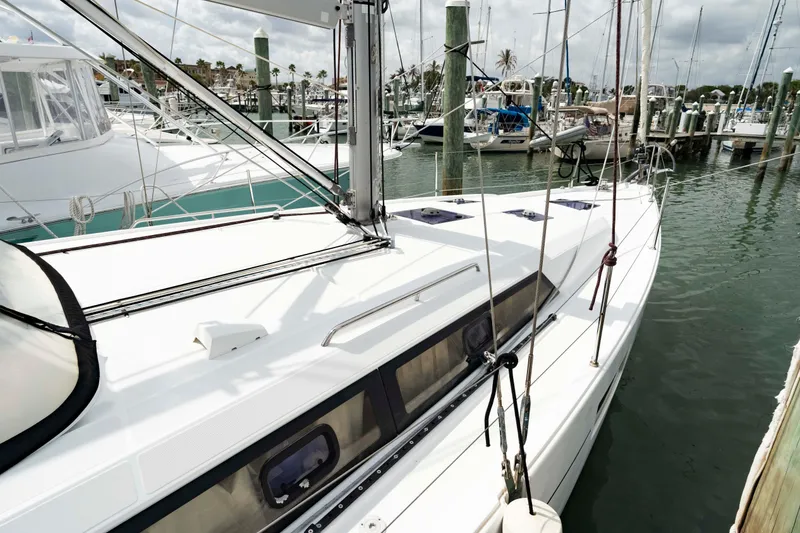 Slide: The Image of 2017 Beneteau Oceanis 41.1 sailboat docked in a marina, showcasing sleek design. - 8