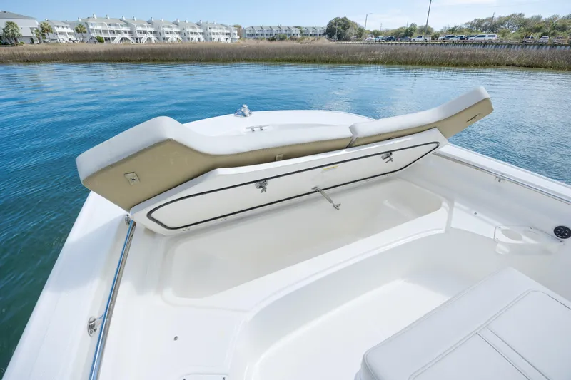 Slide: The Image of 2022 Boston Whaler 190 Montauk boat interior with open storage compartment. - 21
