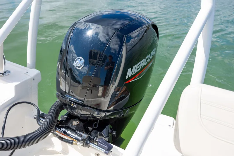 Slide: The Image of Mercury outboard motor on 2022 Boston Whaler 190 Montauk in water. - 9