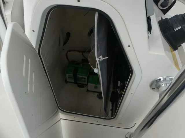 Slide: The Image of View inside storage compartment of a 2021 Key West 203 FS boat. - 14