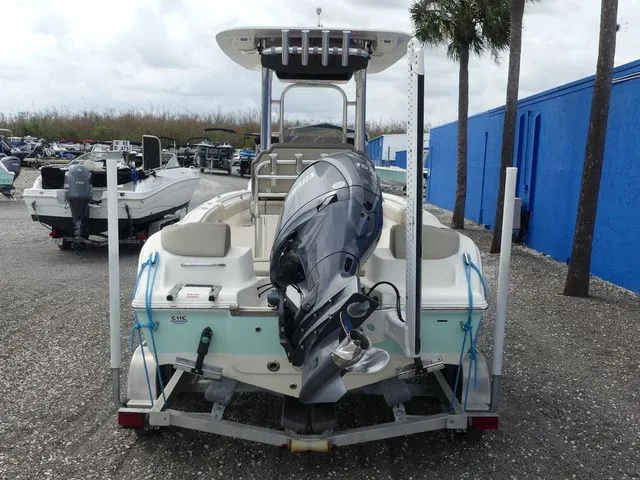 Slide: The Image of 2021 Key West 203 FS boat with outboard motor on trailer. - 5