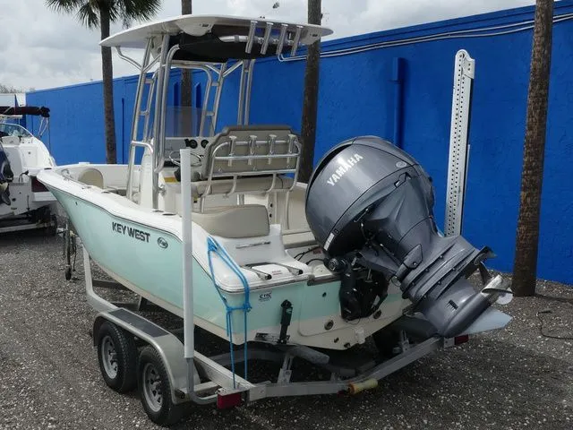 Slide: The Image of 2021 Key West 203 FS boat with Yamaha engine on trailer. - 6
