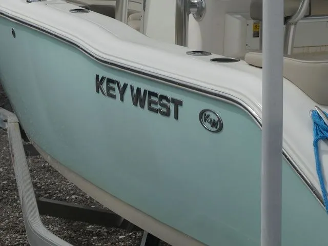 Slide: The Image of Key West 203 FS boat, 2021 model, side view with logo. - 7