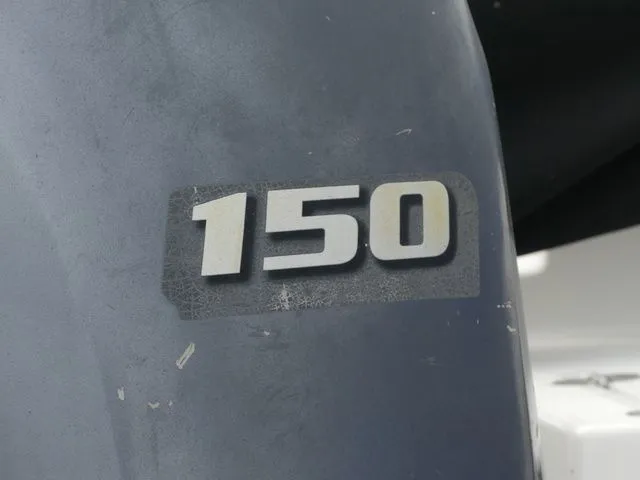 Slide: The Image of Close-up of 150 HP outboard motor, Hurricane SunDeck 217 OB, 2019. - 11