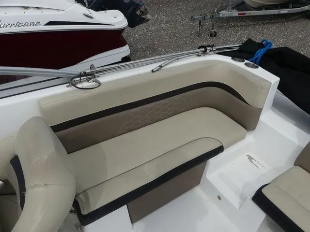 Slide: The Image of Interior view of a 2019 Hurricane SunDeck 217 OB boat. - 15