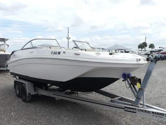 Slide: The Image of 2019 Hurricane SunDeck 217 OB on trailer, side view. - 3