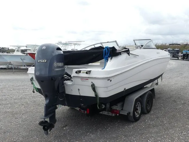 Slide: The Image of 2019 Hurricane SunDeck 217 OB boat with Yamaha outboard motor. - 4