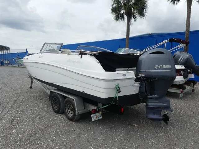 Slide: The Image of 2019 Hurricane SunDeck 217 OB boat with Yamaha outboard motor. - 6