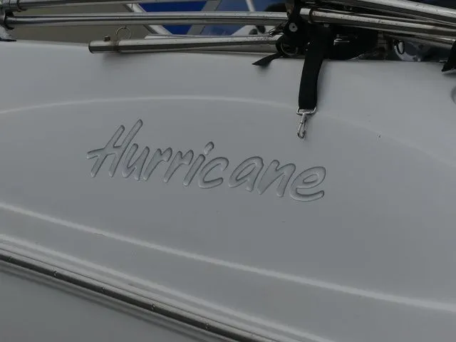 Slide: The Image of Hurricane SunDeck 217 OB 2019 boat, close-up of logo. - 7
