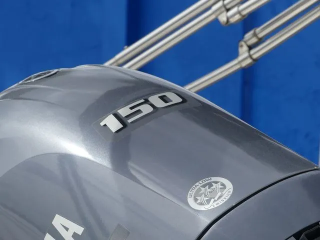 Slide: The Image of Yamaha 150 horsepower outboard motor against a blue background. - 10