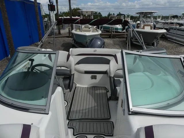 Slide: The Image of 2019 Hurricane SD 2200 OB boat docked at marina. - 13