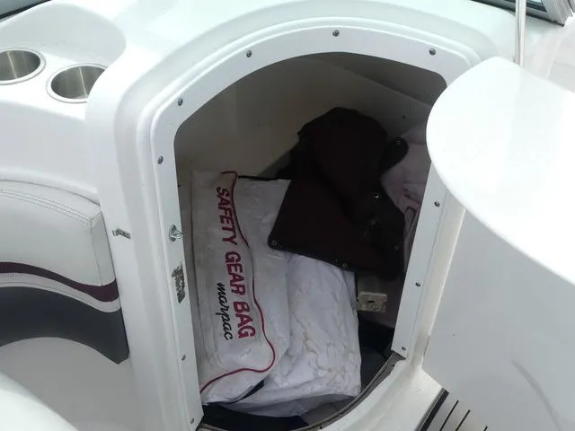 Slide: The Image of Storage compartment in Hurricane SD 2200 OB boat with safety gear. - 16