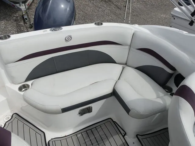 Slide: The Image of Interior of a 2019 Hurricane SD 2200 OB boat with cushioned seating. - 17