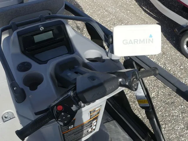 Slide: The Image of 2022 Sea-Doo Switch Cruise 18 controls with Garmin display. - 12
