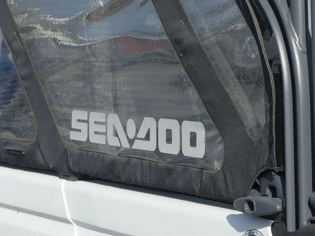 Slide: The Image of Sea-Doo Switch® Cruise 18 - 100 hp, 2022, side view with logo. - 8