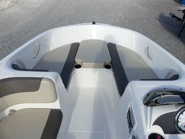 Slide: The Image of Interior view of a 2017 Bayliner Element E16 boat with gray seating. - 12