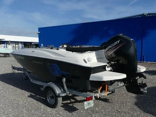 Slide: The Image of 2017 Bayliner Element E16 boat with Mercury engine on trailer. - 6