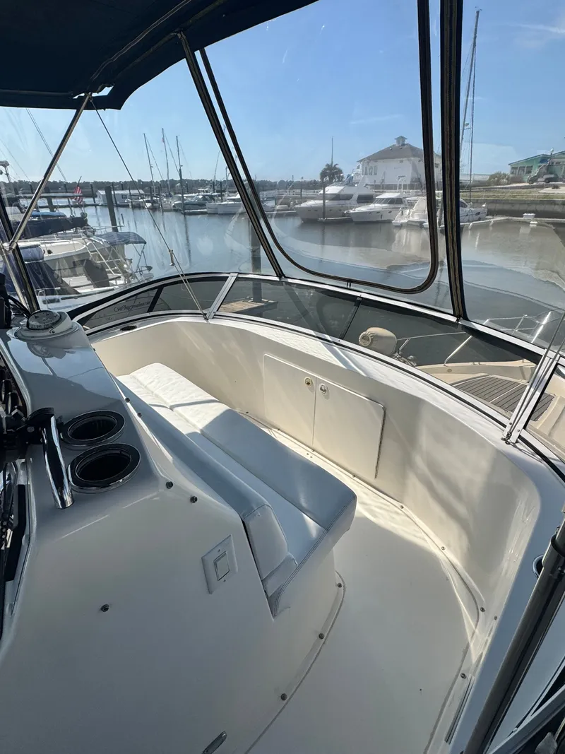 Slide: The Image of Interior of 2000 Silverton 392 Motor Yacht at marina. - 11