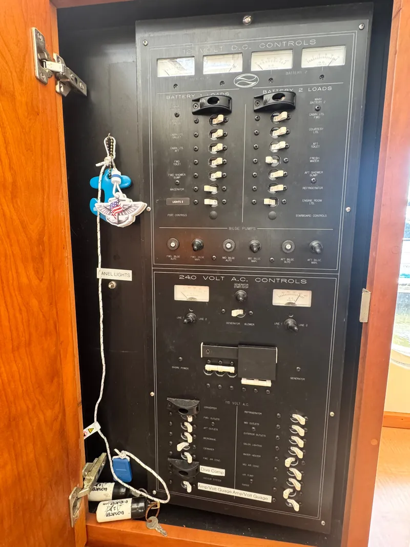 Slide: The Image of Electrical control panel of 2000 Silverton 392 Motor Yacht. - 26