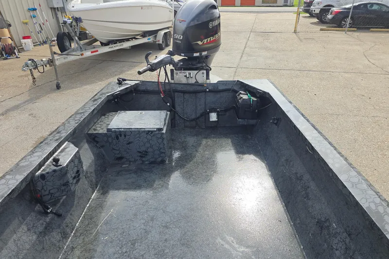 Slide: The Image of Custom Rene Gros 2022 boat with Yamaha VMAX 90 outboard motor in a parking area. - 11