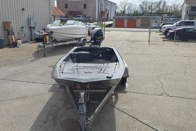 Slide: The Image of Custom 2022 Rene Gros boat on trailer in outdoor storage area. - 7