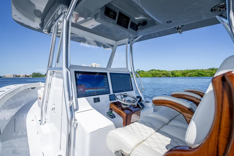 Slide: The Image of Luxurious 2027 Billfish 39 boat interior with advanced navigation system and plush seating. - 3