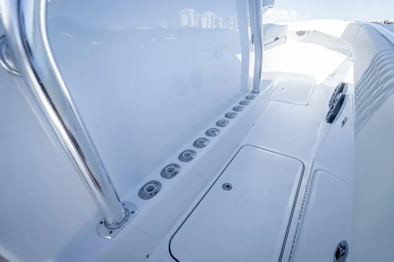 Slide: The Image of 2027 Billfish 39 boat interior with sleek white deck and chrome railings. - 8
