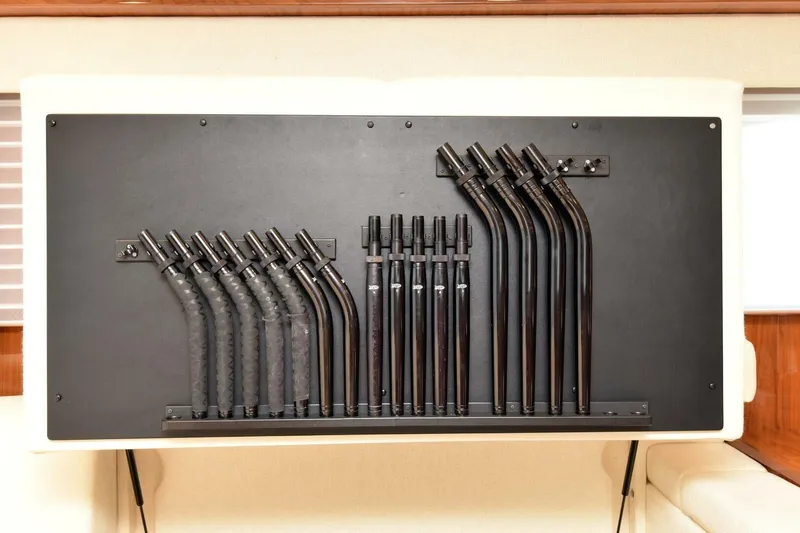 Slide: The Image of Fishing rod holders on a 2019 Viking 80 Sky Bridge yacht interior. - 10