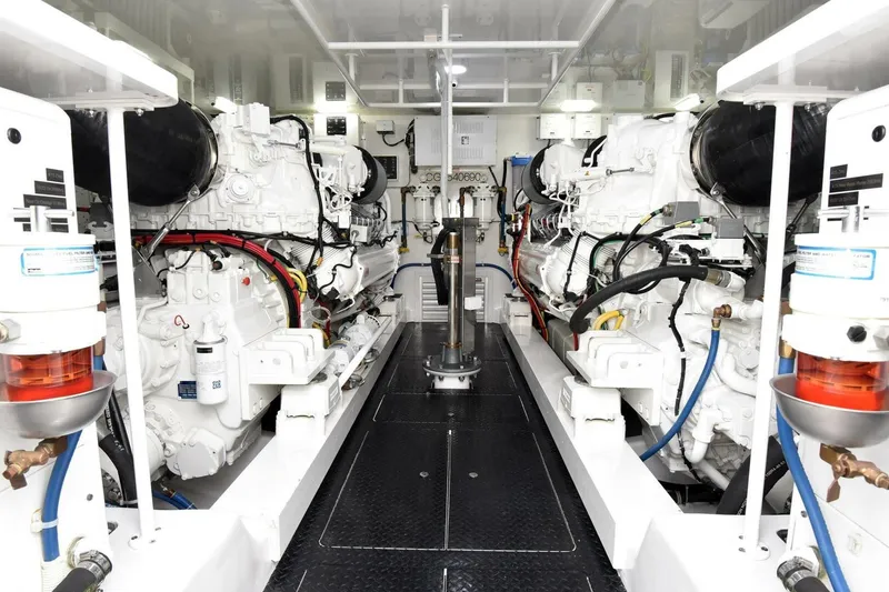 Slide: The Image of Engine room of 2019 Viking 80 Sky Bridge yacht, showcasing dual powerful engines. - 107