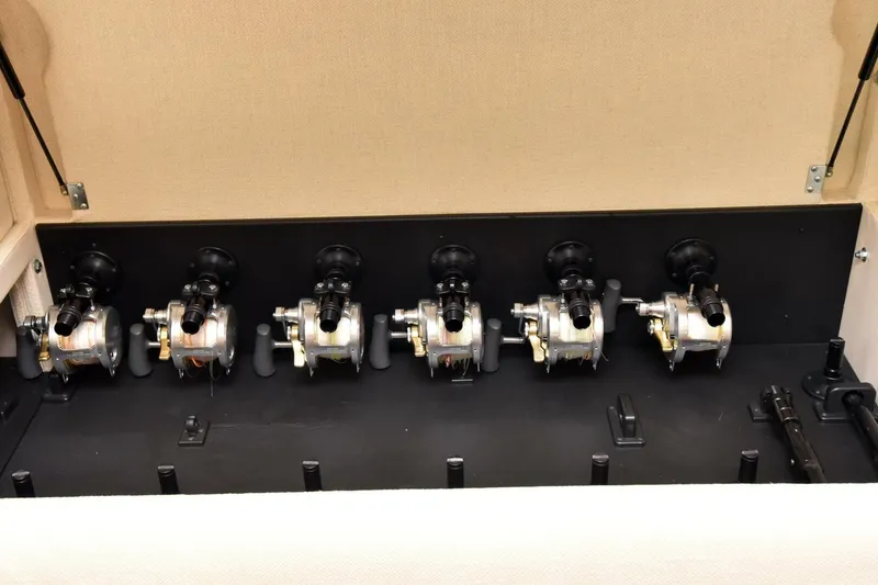 Slide: The Image of Fishing reels storage on 2019 Viking 80 Sky Bridge yacht. - 11