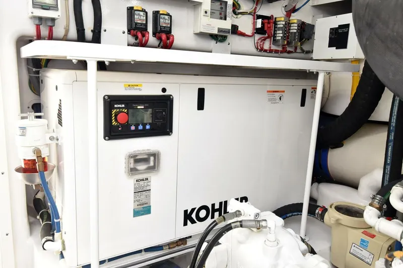 Slide: The Image of Engine room of 2019 Viking 80 Sky Bridge yacht with Kohler generator. - 110