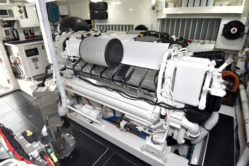 Slide: The Image of Engine room of 2019 Viking 80 Sky Bridge yacht, showcasing advanced machinery and components. - 113
