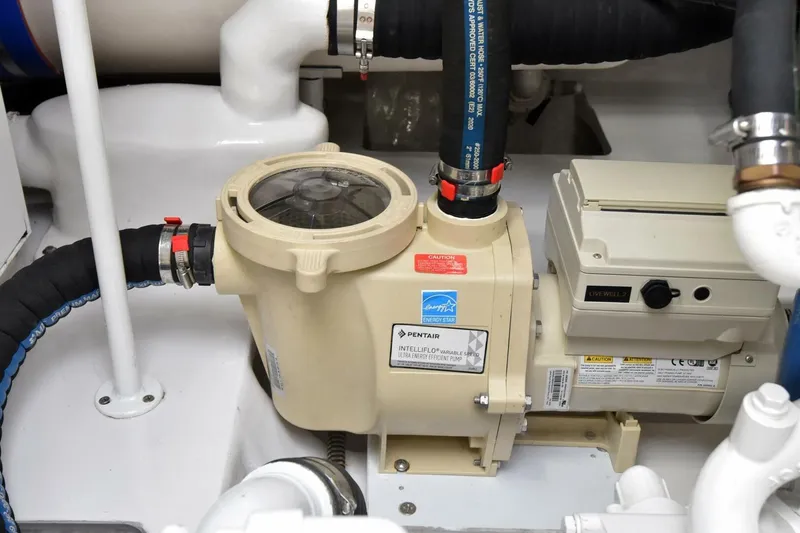 Slide: The Image of Engine room of 2019 Viking 80 Sky Bridge yacht with Pentair pump system. - 123