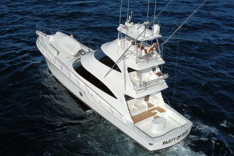 Slide: The Image of 2019 Viking 80 Sky Bridge yacht cruising on open sea, aerial view. - 128