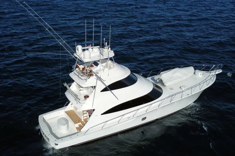 Slide: The Image of 2019 Viking 80 Sky Bridge yacht cruising on open sea. - 129